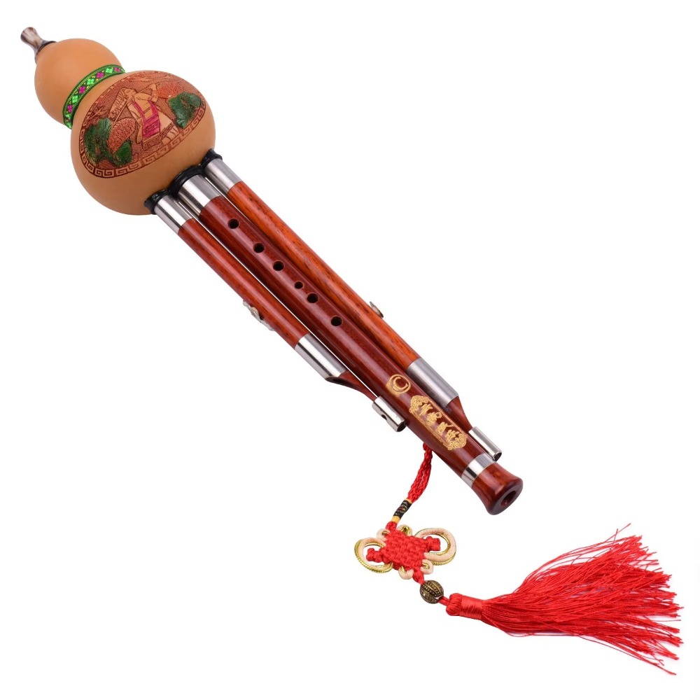 A Musical Instrument With Keys - Flauta de calabaza Hulusi de 3