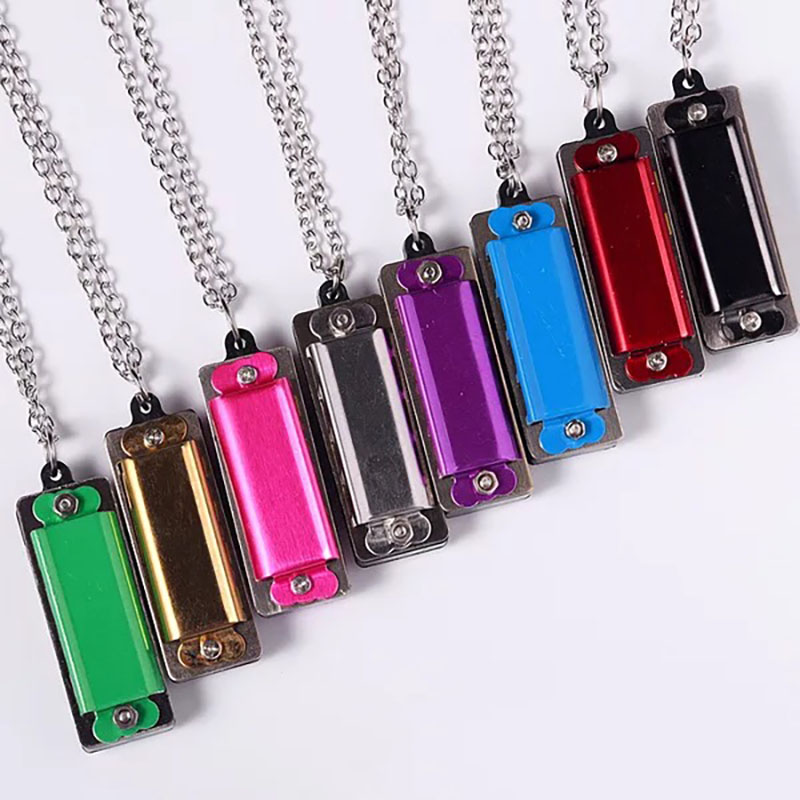 Mini collar de armónica person - Musical Instrument Logo reseña y precio