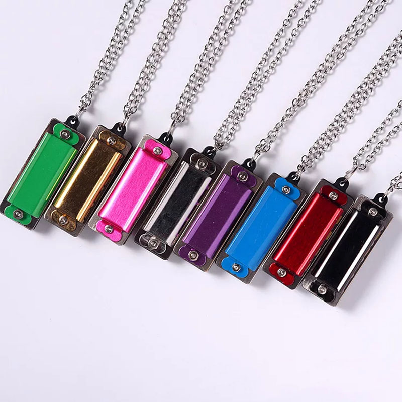 Mini collar de armónica person - Musical Instrument Logo reseña y precio
