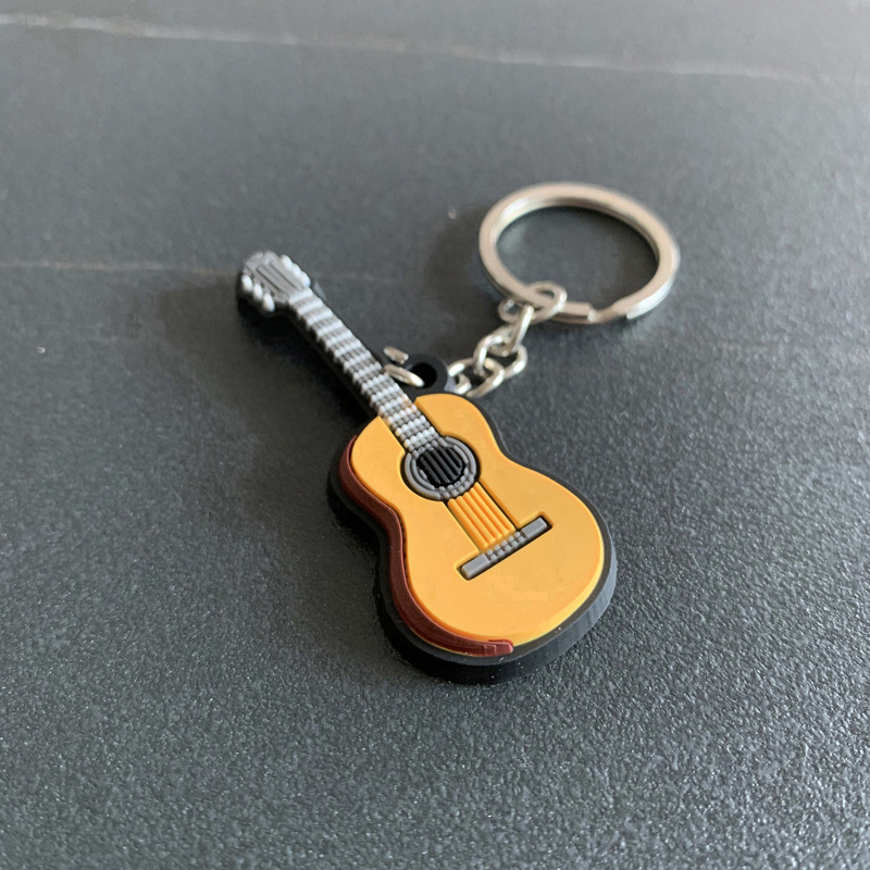 LLavero de guitarra para hombr - Musical Instrument Photo reseña y precio