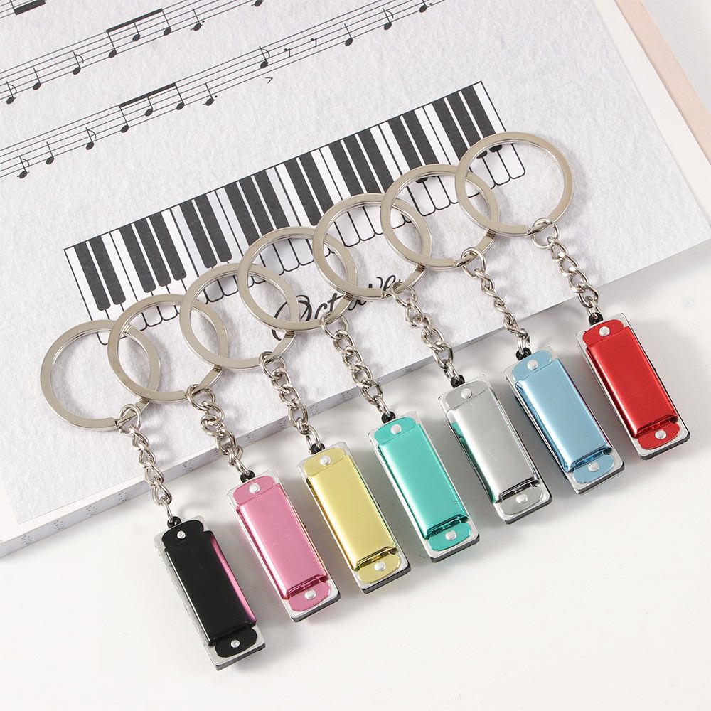 Llavero de armónica con forma  - Musical Instruments Cartoon reseña y precio