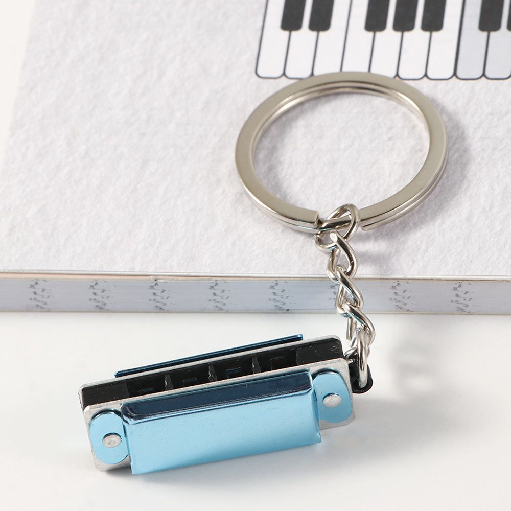 Llavero de armónica con forma  - Musical Instruments Cartoon reseña y precio