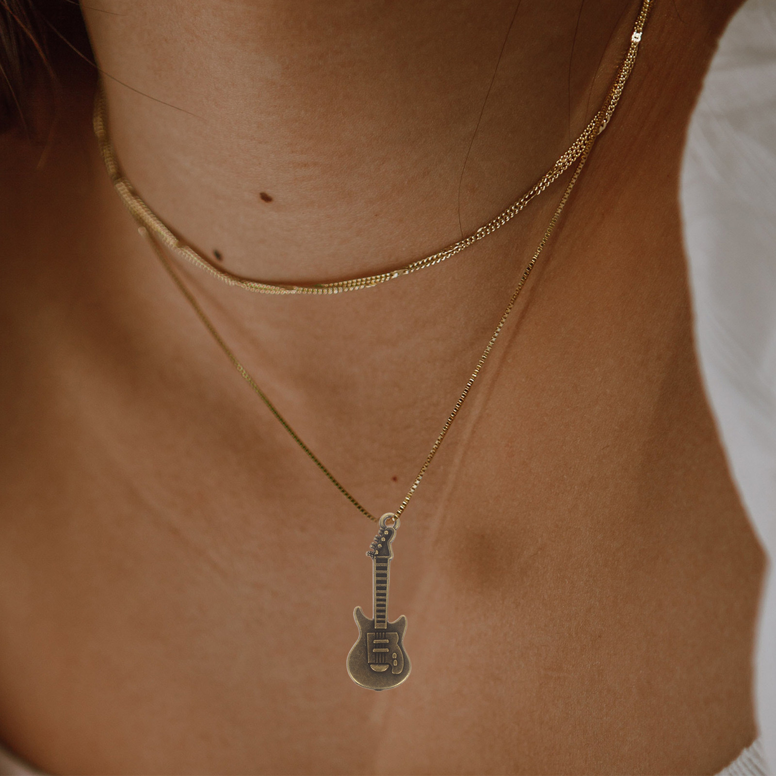 50 Piezas de Colgantes de Guit - Musical Instrument Jewelry reseña y precio