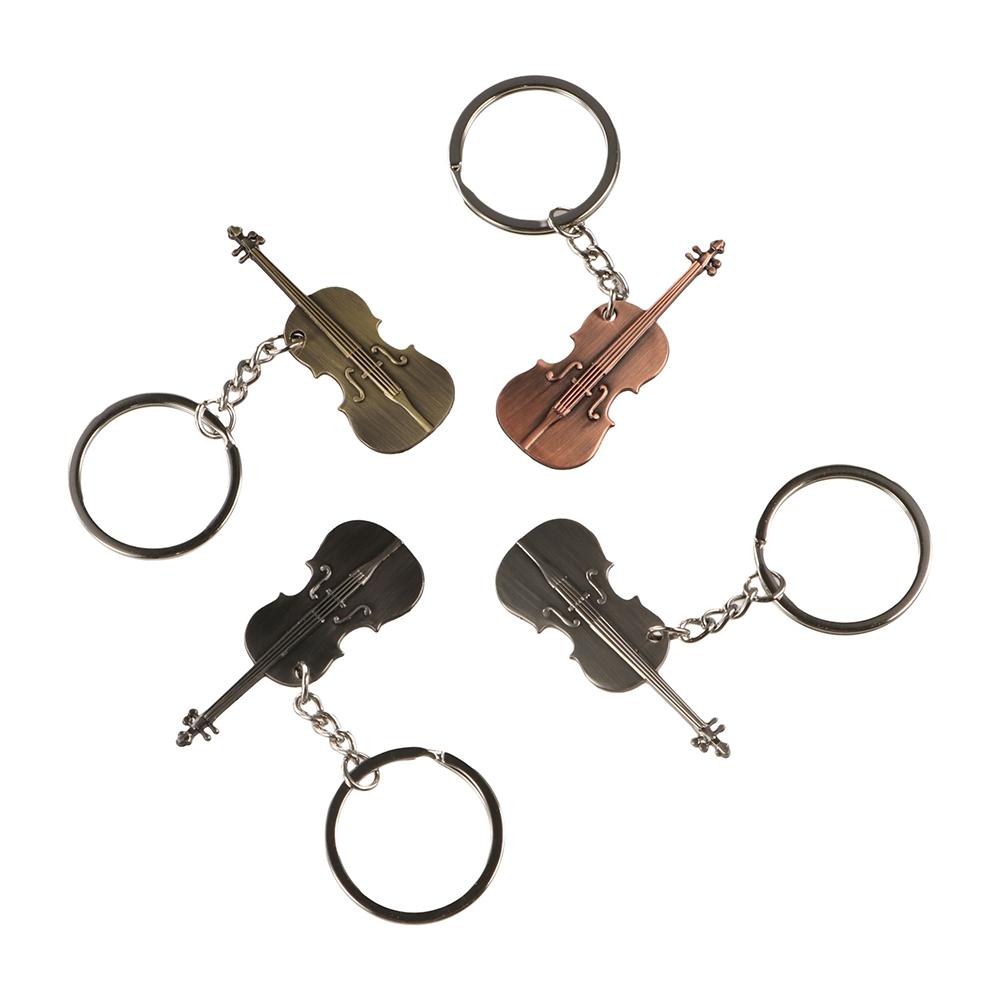 Llavero de guitarra de metal g - Musical Instruments Cartoon reseña y precio