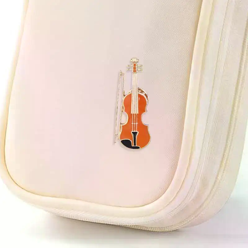 Insignia de orquesta sinfónica - Musical Instrument Jewelry reseña y precio